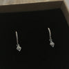 Close-up of Rhombus Dangle earrings in 925 Sterling Silver