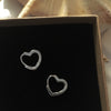 Close up of Heart Huggies in 925 Sterling Silver